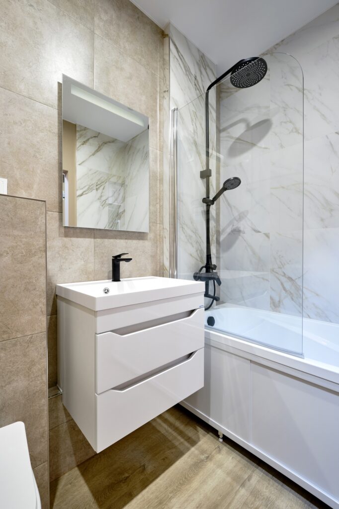 Modern bathroom design featuring elegant fixtures and stylish finishes